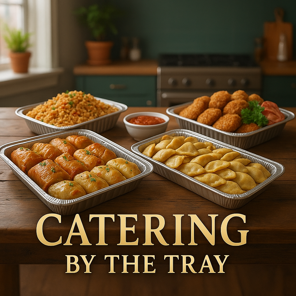 Eastern European hot food trays including pierogi, stuffed cabbage rolls, cutlets and sides, prepared for events by European Food & Gifts in Gurnee, Illinois.