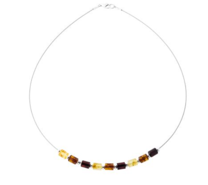 A subtle necklace with rollers made of colored amber