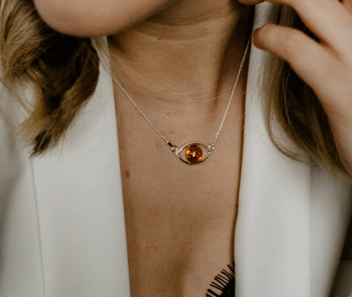 Mysterious "Eye of Ra" silver 925 necklace with cognac amber